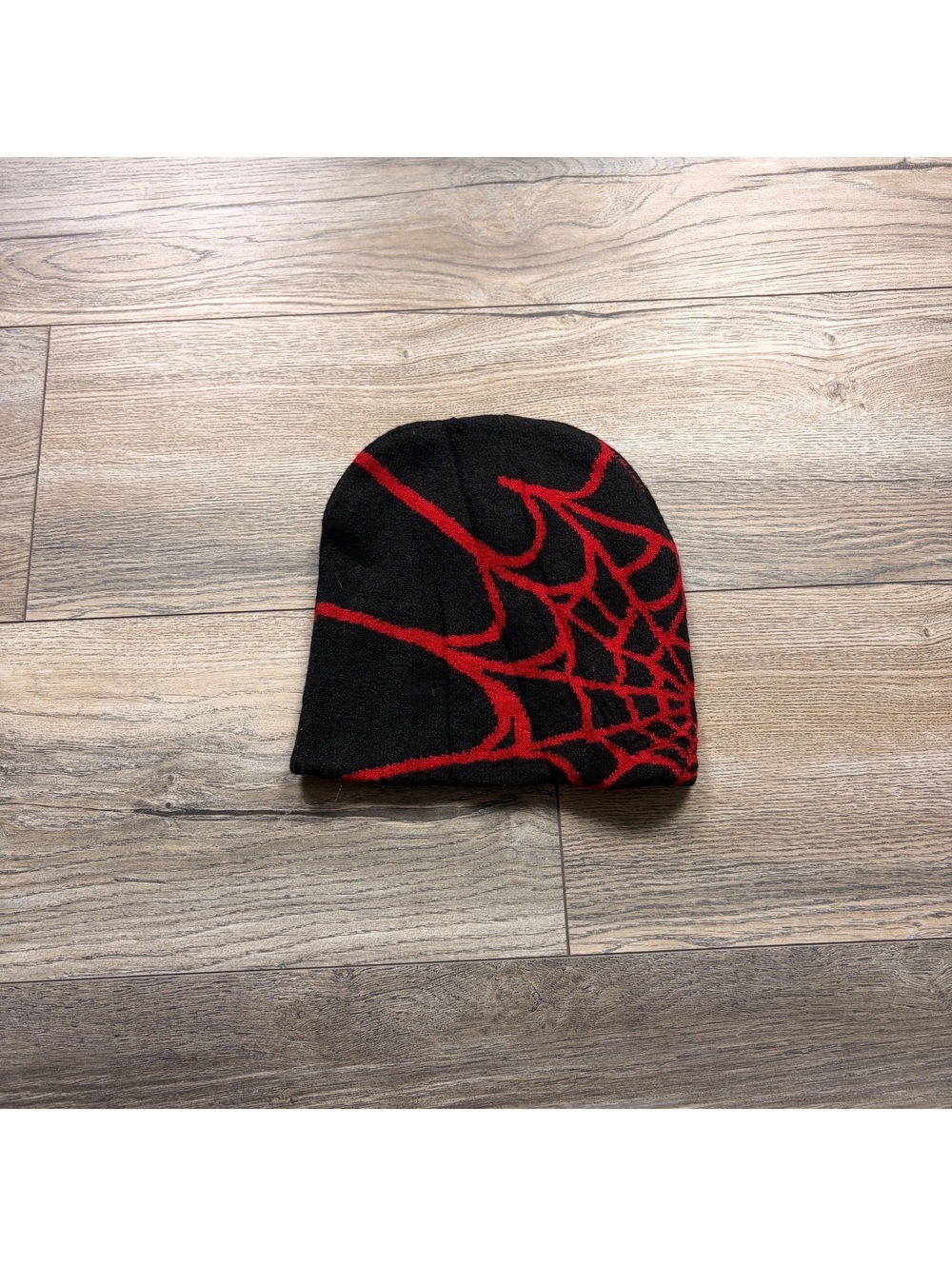 Black Beanie Hat with Red Spider Web Design